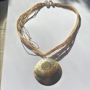 Gold Multi-Strand Necklace with Circular Pendant